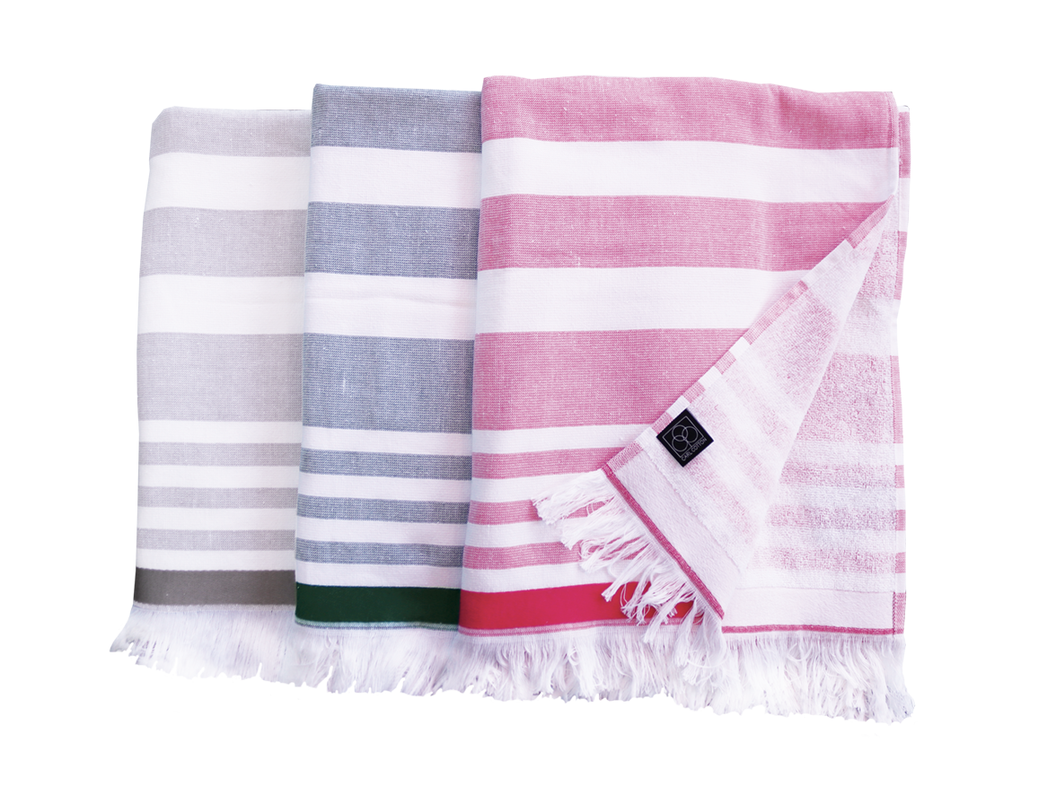 Drei Hamam-Wellnesstuecher von CARL COTTON in drei verschiedenen Farben.