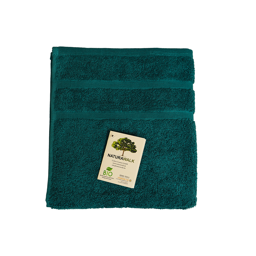 Ein Handtuch von NATURAWALK aus 100 Prozent Bio-Baumwolle in der Groesse 50x100cm. Farbe Petrol. Modell Milano Deluxe Petrol.