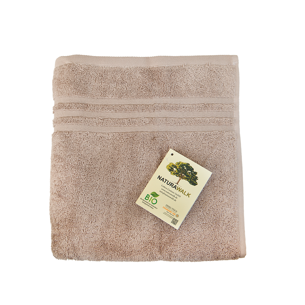 Ein Handtuch von NATURAWALK aus 100 Prozent Bio-Baumwolle in der Groesse 50x100cm. Farbe Beige. Modell Milano Exclusiv Beige.