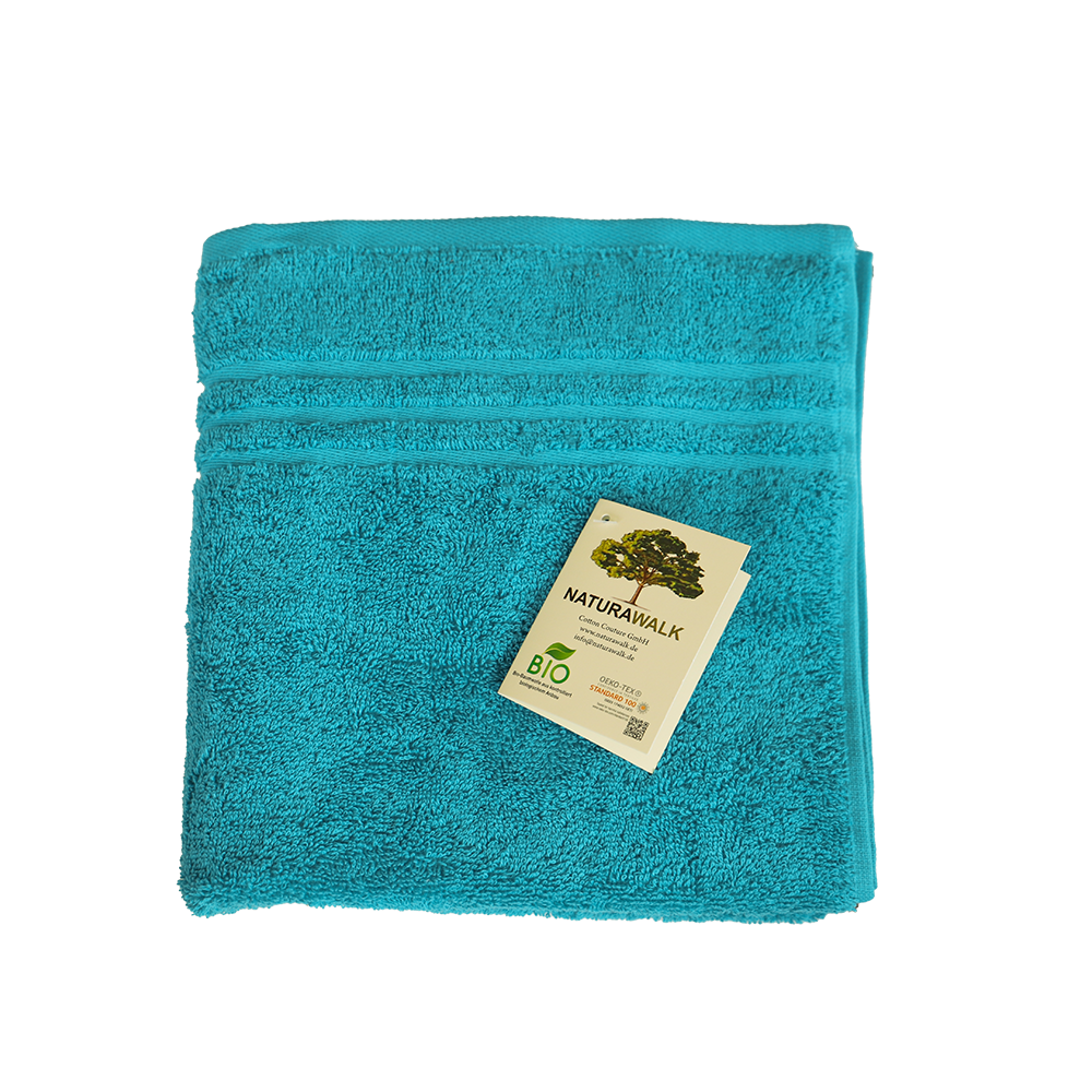 Ein Handtuch von NATURAWALK aus 100 Prozent Bio-Baumwolle in der Groesse 50x100cm. Farbe Tuerkis. Modell Milano Exclusiv Petrol.