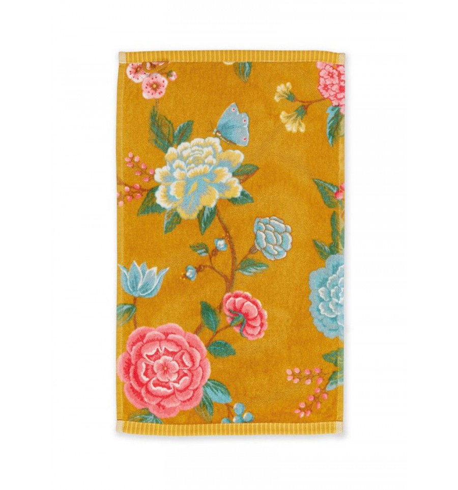 Ein Gaestetuch von PIP STUDIO aus 100 Prozent Baumwolle in der Groesse 30x50cm mit Muster aus Blumen. Farbe Gelb. Modell Good Evening Yellow.