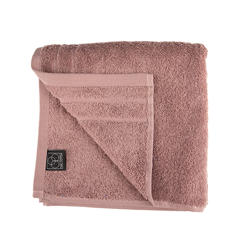 Ein Handtuch von CARL COTTON aus 100 Prozent Baumwolle in der Groesse 50x100cm. Farbe Rosegold. Modell Trend Rosenholz.
