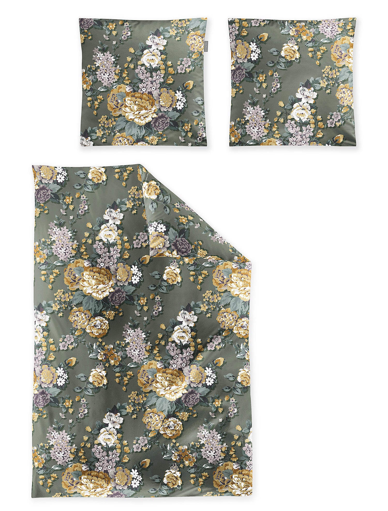 Zwei Kopfkissen und eine Bettdecke bezogen mit Edel-Feinbiber Bettwaesche mit einem Muster aus Blumen in der Farbe Gruen. Modell Blumen Gruen.
