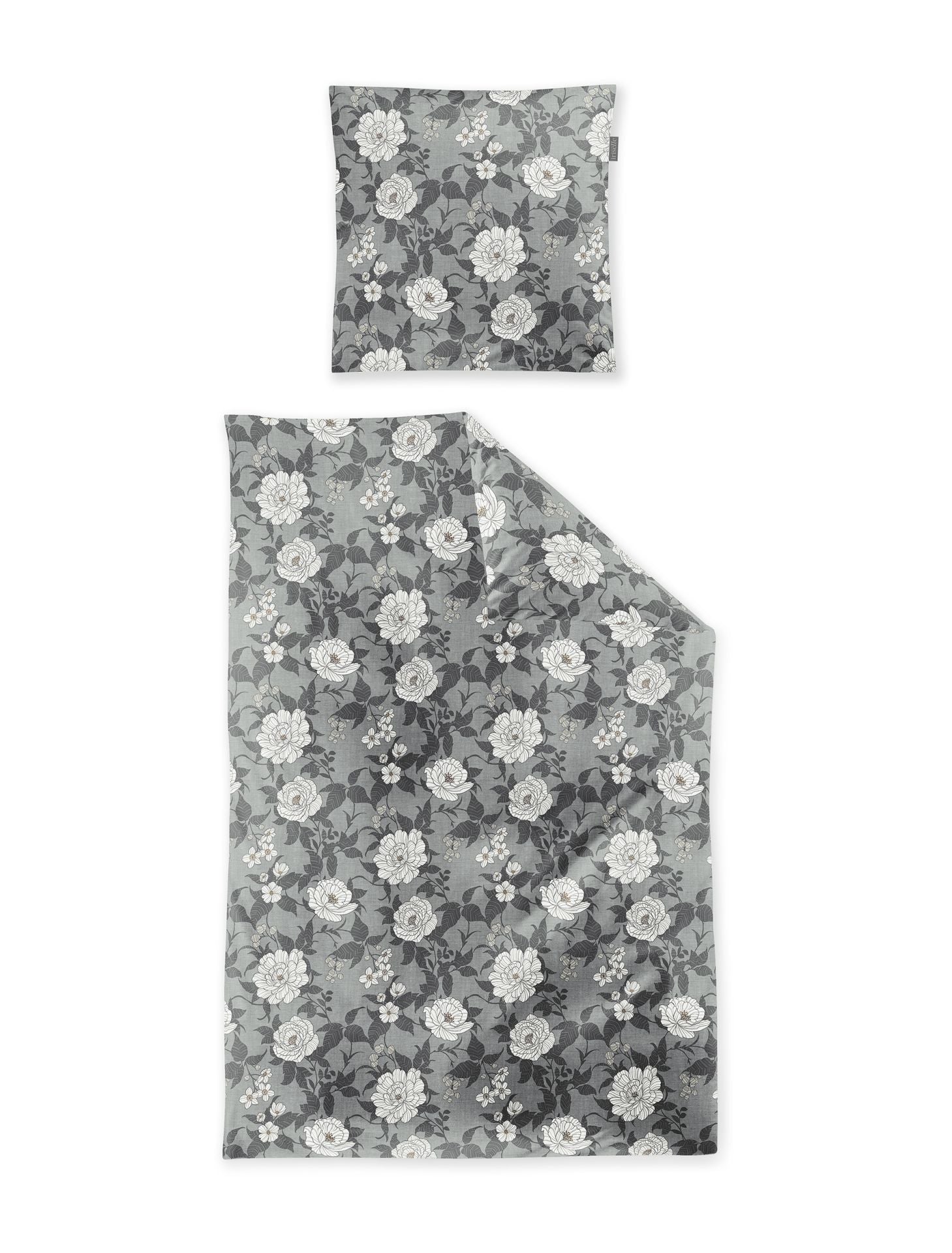 Ein Kopfkissen und eine Bettdecke bezogen mit Edel-Feinbiber Bettwaesche mit einem Muster aus Blumen in der Farbe Grau. Modell Koala Grau.