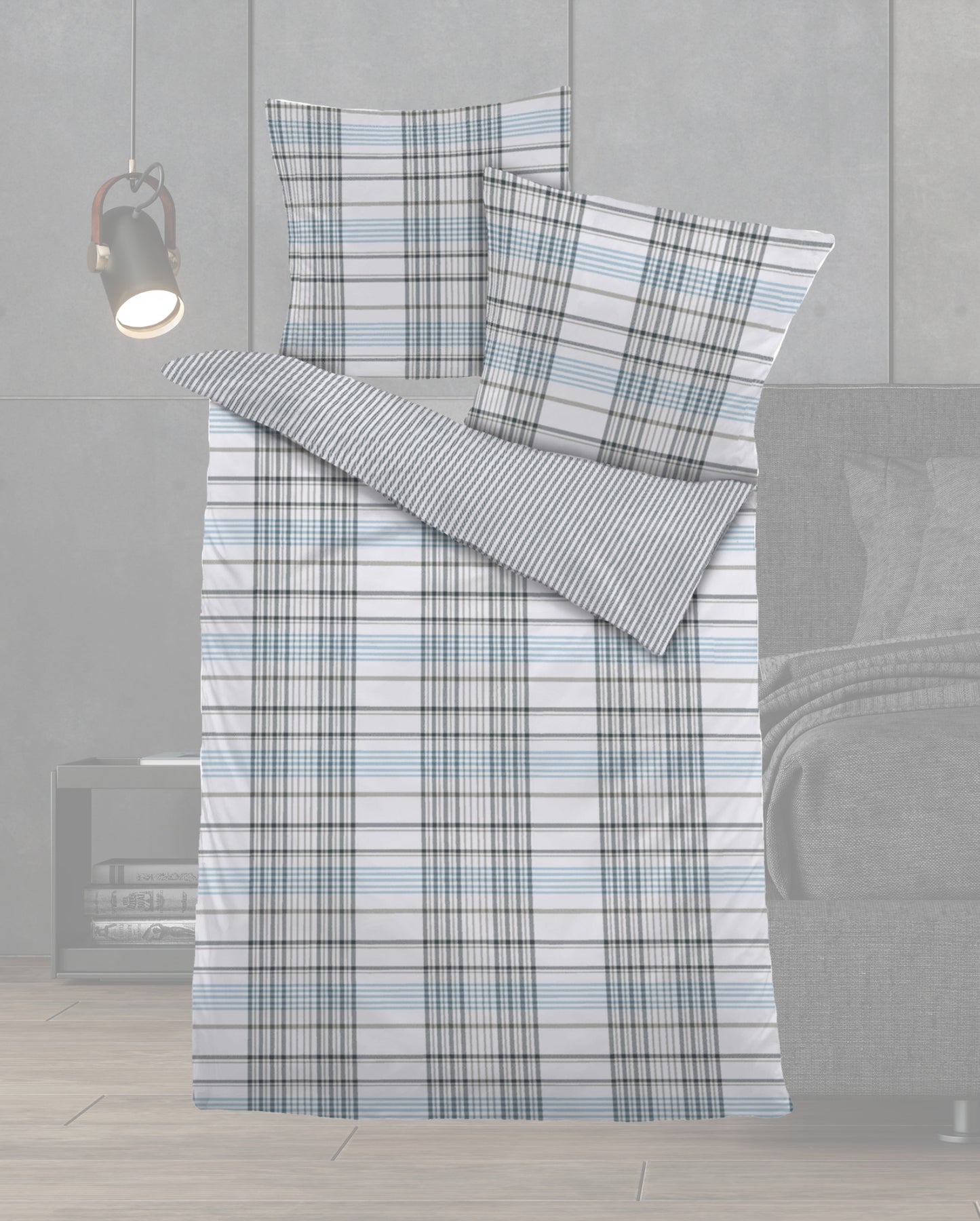Ein Bettbezug-Set aus einem Kopfkissen und einer Bettdecke bezogen mit Feinbiber Bettwaesche aus 100 Prozent Baumwolle mit Muster aus kleinen Karos in der Farbe Grau. Modell  Karo Grau/Blau.