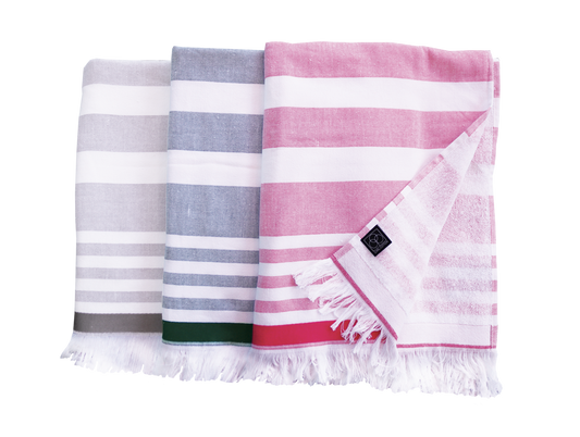 Drei Hamam-Wellnesstuecher von CARL COTTON in drei verschiedenen Farben.