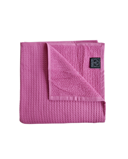 Ein Handtuch von CARL COTTON aus 100 Prozent Baumwolle in der Groesse 50x100cm. Farbe Pink. Modell Waffelpique Crocus.