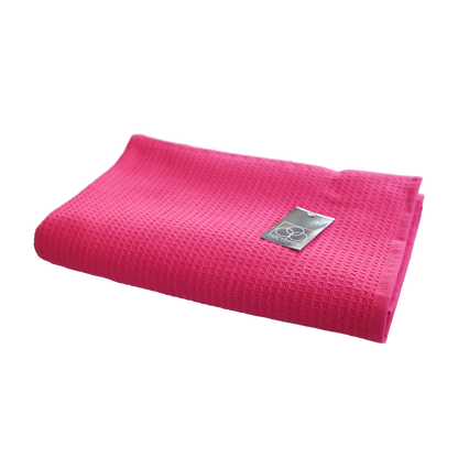 Ein Duschtuch von CARL COTTON aus 100 Prozent Baumwolle in der Groesse 70x140cm. Farbe Pink. Modell Waffelpique Fuchsia.