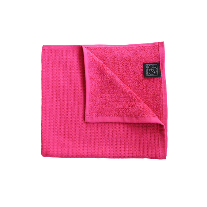 Ein Handtuch von CARL COTTON aus 100 Prozent Baumwolle in der Groesse 50x100cm. Farbe Pink. Modell Waffelpique Fuchsia.