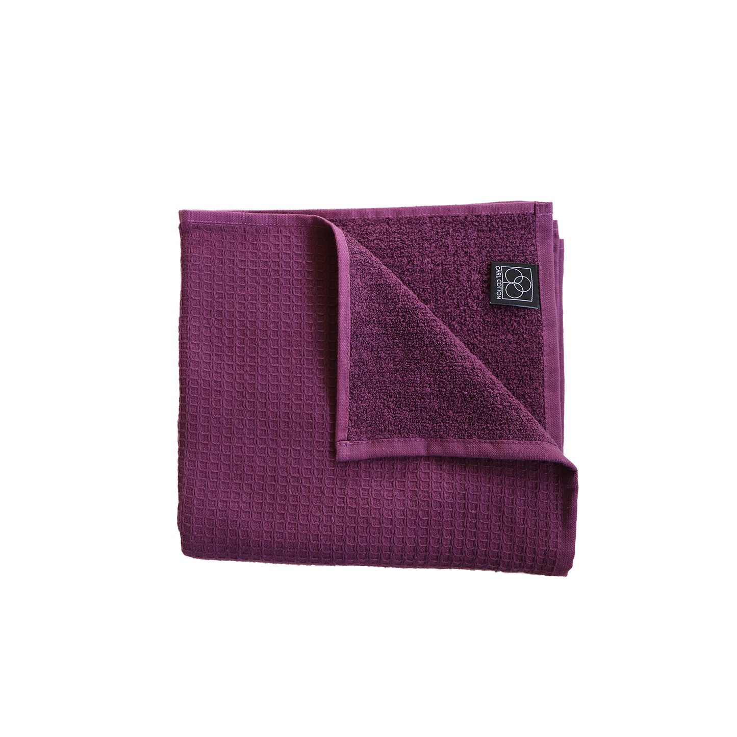 Ein Handtuch von CARL COTTON aus 100 Prozent Baumwolle in der Groesse 50x100cm. Farbe Lila. Modell Waffelpique Plum.