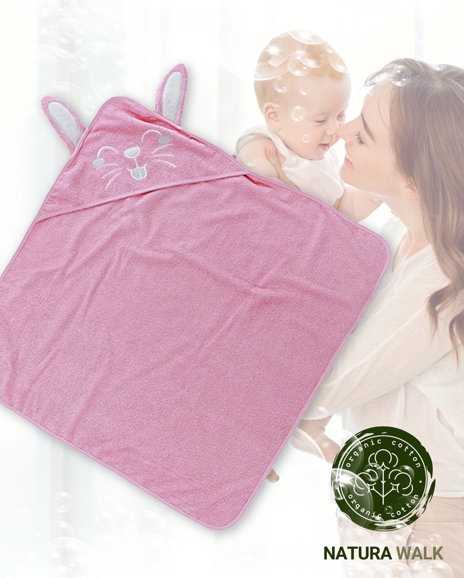 Ein Babyhandtuch mit Kapuze und Hasenmotiv in der Farbe Rosa. Modell Hase - Rosa. 