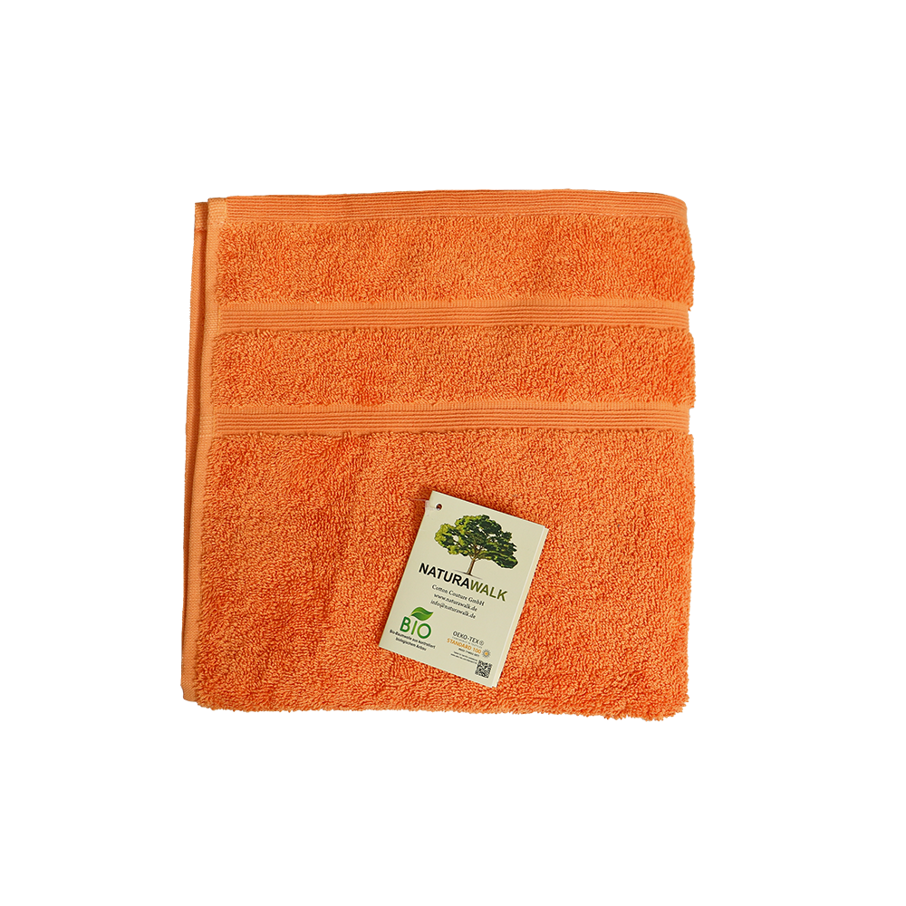Ein Handtuch von NATURAWALK aus 100 Prozent Bio-Baumwolle in der Groesse 50x100cm. Farbe Orange. Modell Milano Deluxe Oxford.