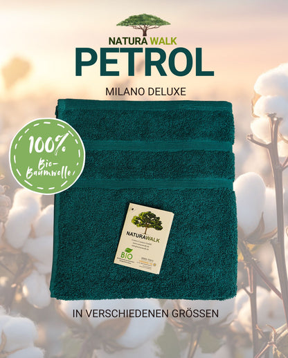 Ein Handtuch von NATURAWALK aus 100 Prozent Bio-Baumwolle in der Farbe Petrol. Modell Milano Deluxe Petrol. 