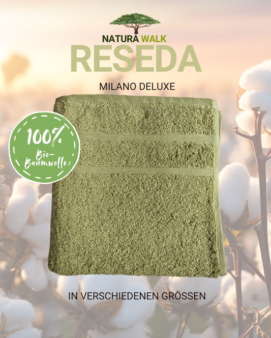 Ein Handtuch von NATURAWALK aus 100 Prozent Bio-Baumwolle in der Farbe Gruen. Modell Milano Deluxe Reseda. 