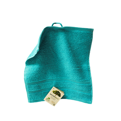 Ein Seiftuch von NATURAWALK aus 100 Prozent Bio-Baumwolle in der Groesse 30x30cm. Farbe Tuerkis. Modell Milano Deluxe Sea.