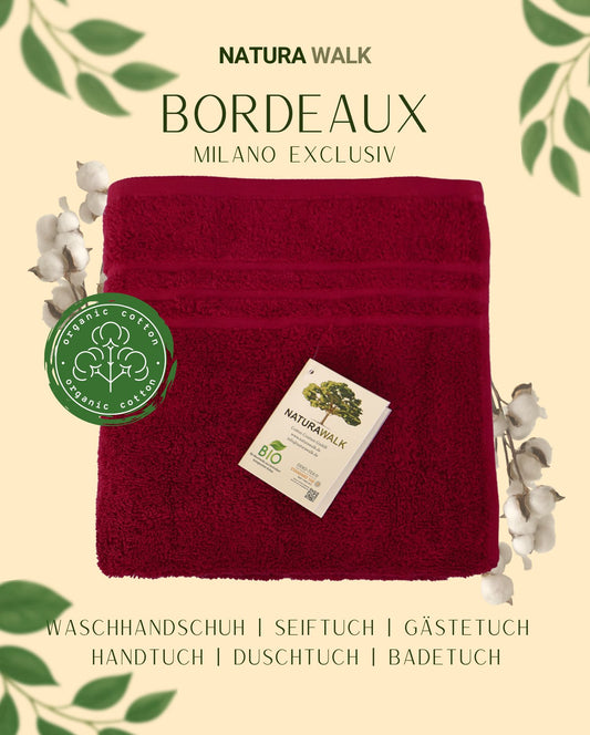 Ein Handtuch von NATURAWALK aus 100 Prozent Bio-Baumwolle in der Farbe Bordeaux. Modell Milano Exclusiv Bordeaux. 