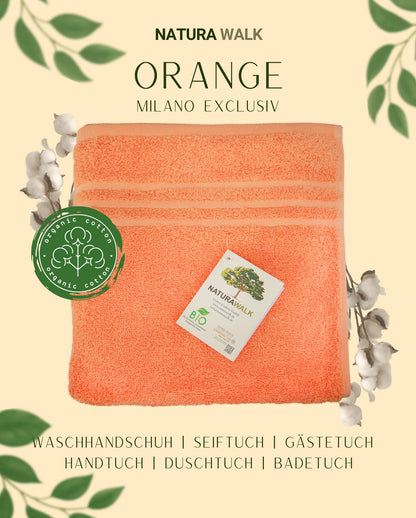 Ein Waschhandschuh von NATURAWALK aus 100 Prozent Bio-Baumwolle in der Groesse 16x21cm. Farbe Orange. Modell Milano Exclusiv Orange.