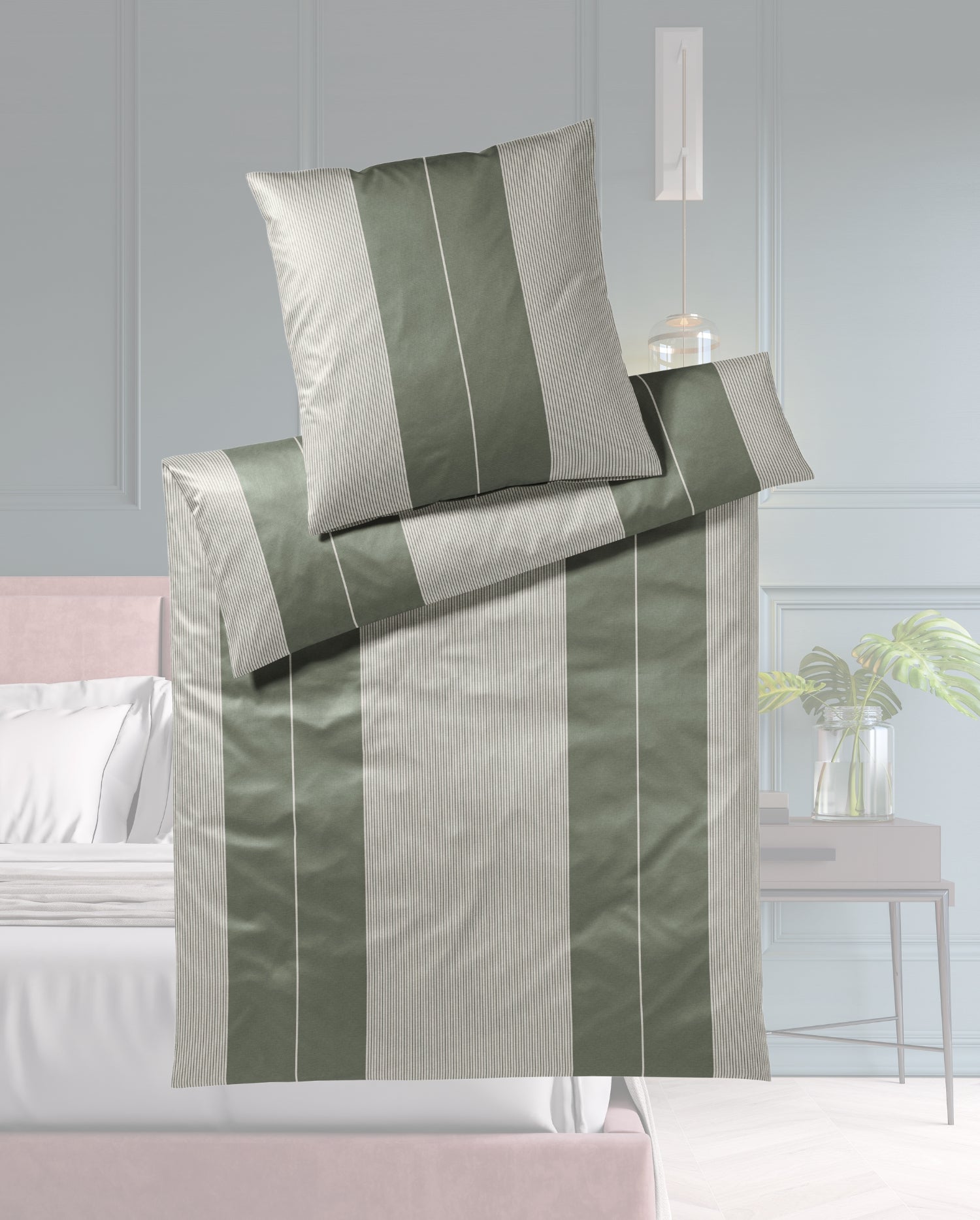 Ein Bettbezug-Set aus einem Kopfkissen und einer Bettdecke bezogen mit seidig-weicher Mako-Satin Bettwaesche aus 100 Prozent Baumwolle mit vertikalen Streifen in der Farbe Gruen. Modell Moos.