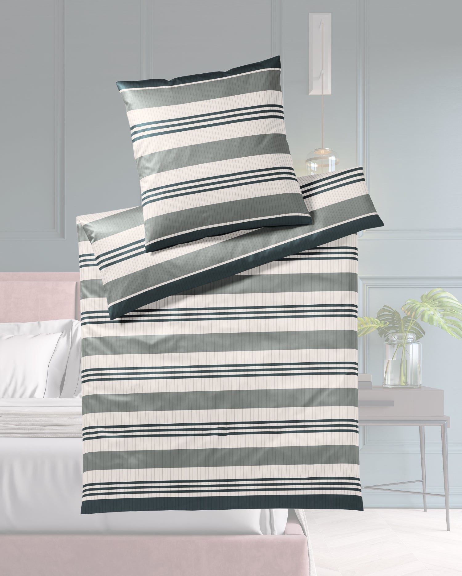 Ein Bettbezug-Set aus einem Kopfkissen und einer Bettdecke bezogen mit seidig-weicher Mako-Satin Bettwaesche aus 100 Prozent Baumwolle mit horizontalen Streifen in der Farbe Gruen. Modell Stripe Moos.