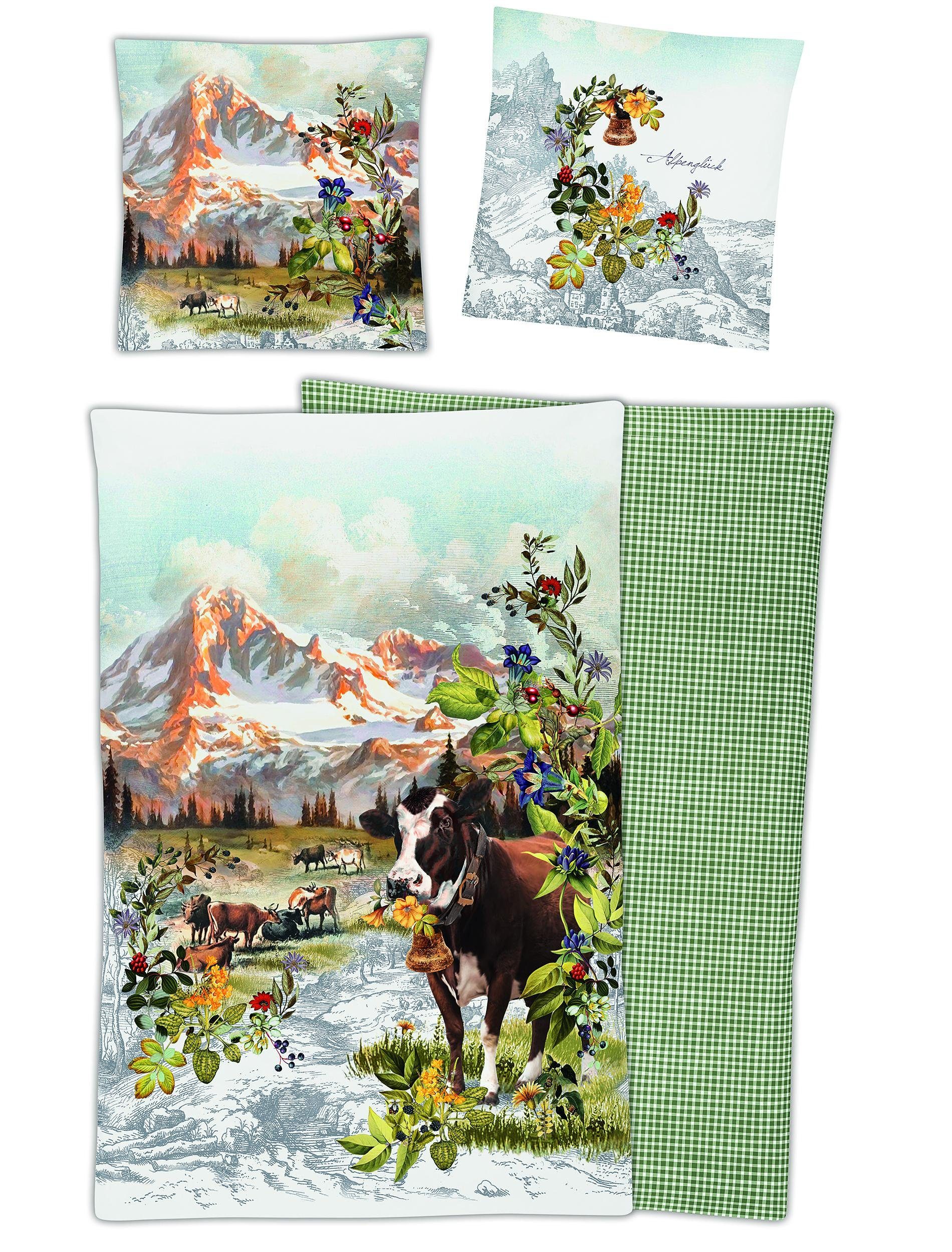 Zwei Kopfkissen und eine Bettdecke bezogen mit Mako-Satin Bettwaesche mit einem Muster aus Alpenlandschaft in der Farbe Gruen. Modell Magic Alpenglueck.