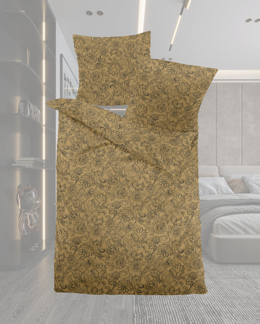 Ein Bettbezug-Set aus einem Kopfkissen und einer Bettdecke bezogen mit Melange-Flanell Bettwaesche aus 100 Prozent Baumwolle mit Muster aus Ornamenten in der Farbe Braun. Modell Heather Arabesque.