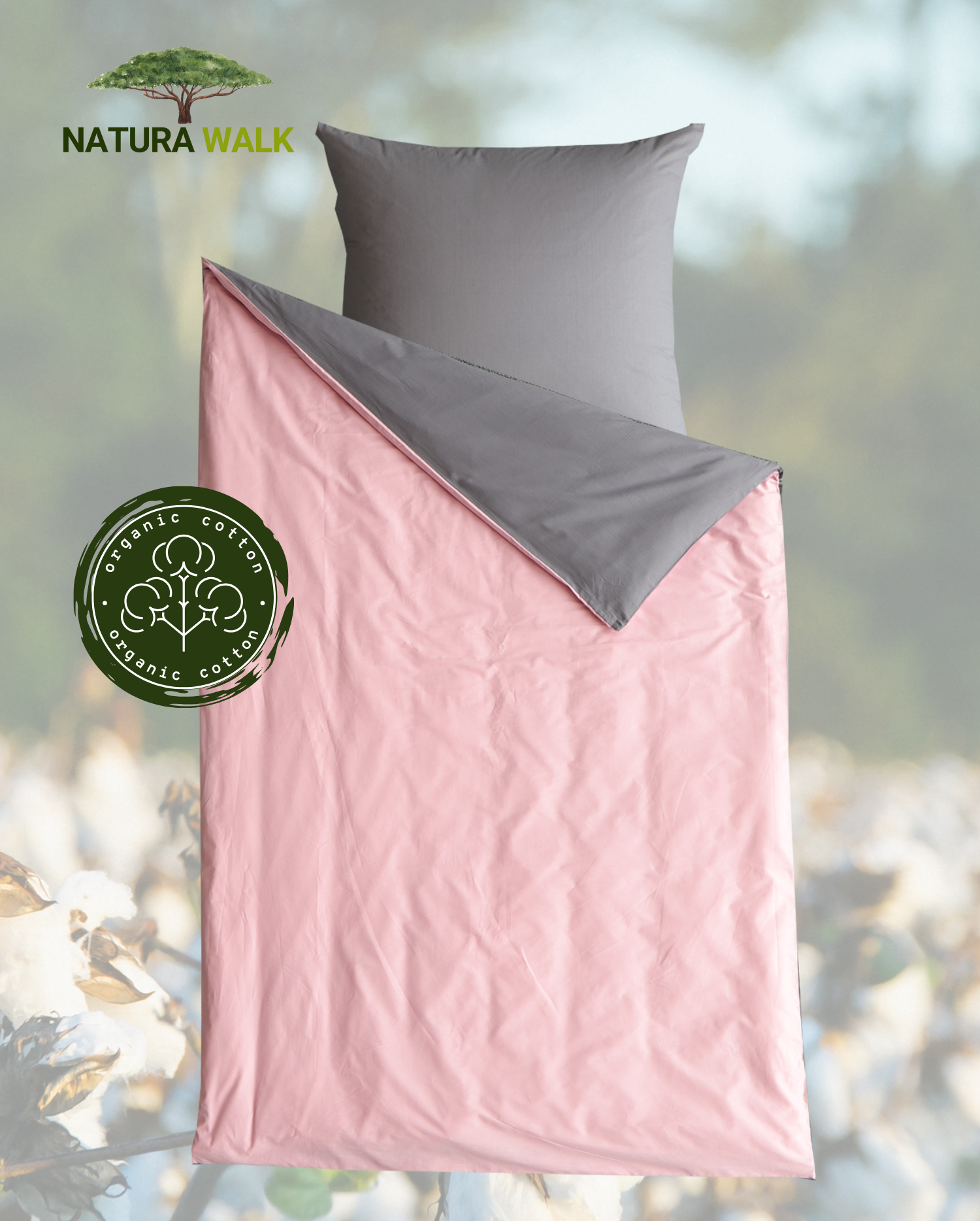 Ein Kopfkissen und eine Bettdecke bezogen mit Renforce Bettwaesche in der Farbe Rosa. Rueckseite Anthrazit. Modell Anthrazit/Rosa.