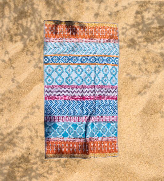 Ein Strandtuch von Lasa Home in der Groesse 100x180cm aus 100 Prozent Baumwolle in der Farbe Mehrfarbig. Modell Togo.