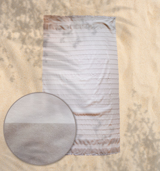 Ein Strandtuch von Naturawalk in der Groesse 96x180cm aus 100 Prozent Bio-Baumwolle in der Farbe Beige. Modell Santa Cruz.
