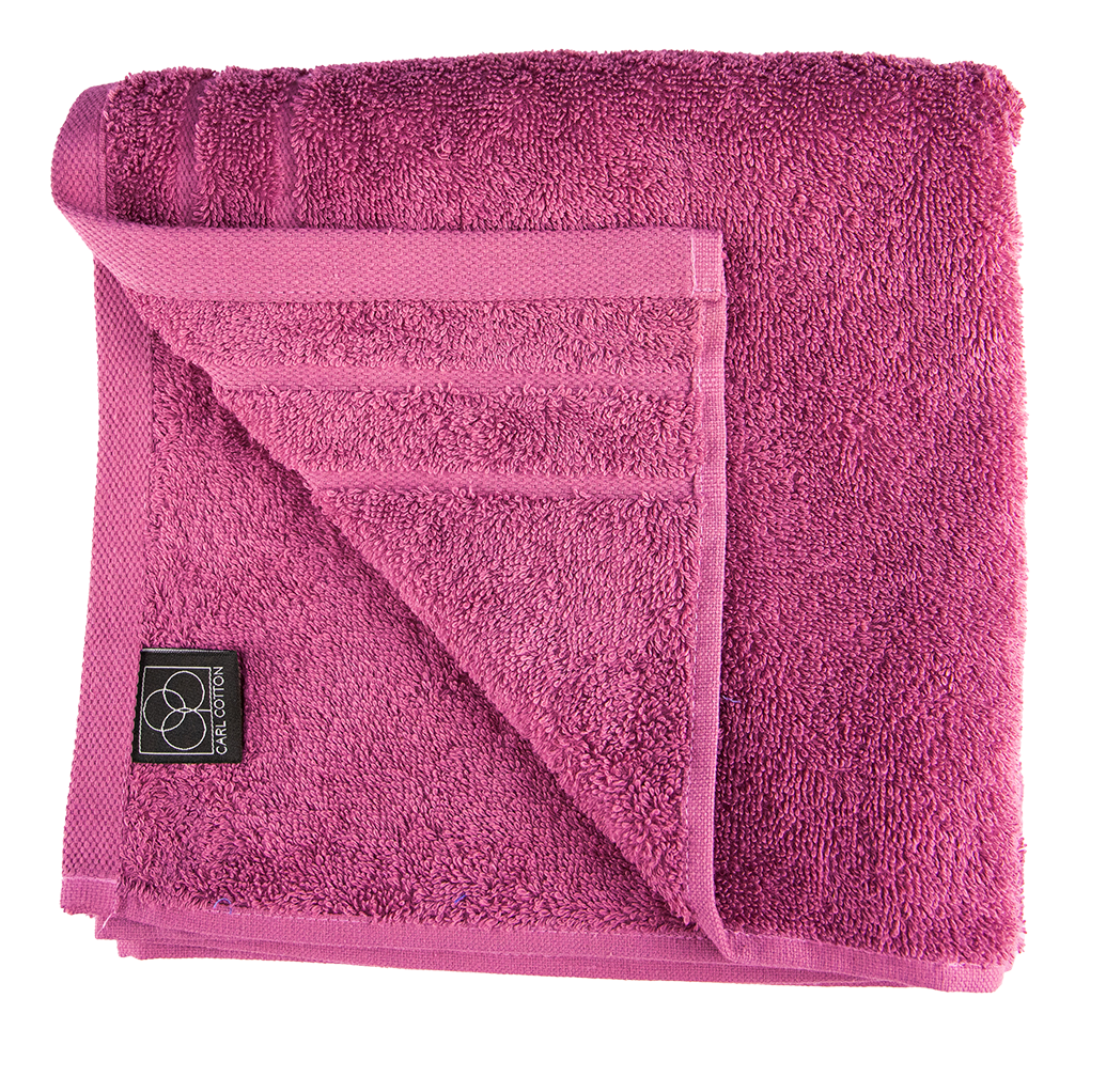 Ein Handtuch von CARL COTTON aus 100 Prozent Baumwolle in der Groesse 50x100cm. Farbe Pink. Modell Trend Fuchsia.