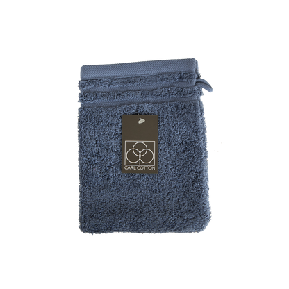 Ein Waschhandschuh von CARL COTTON aus 100 Prozent Baumwolle in der Groesse 16x21cm. Farbe Blau. Modell Trend Jeans.