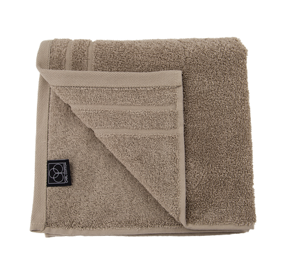Ein Handtuch von CARL COTTON aus 100 Prozent Baumwolle in der Groesse 50x100cm. Farbe Taupe. Modell Trend Taupe.