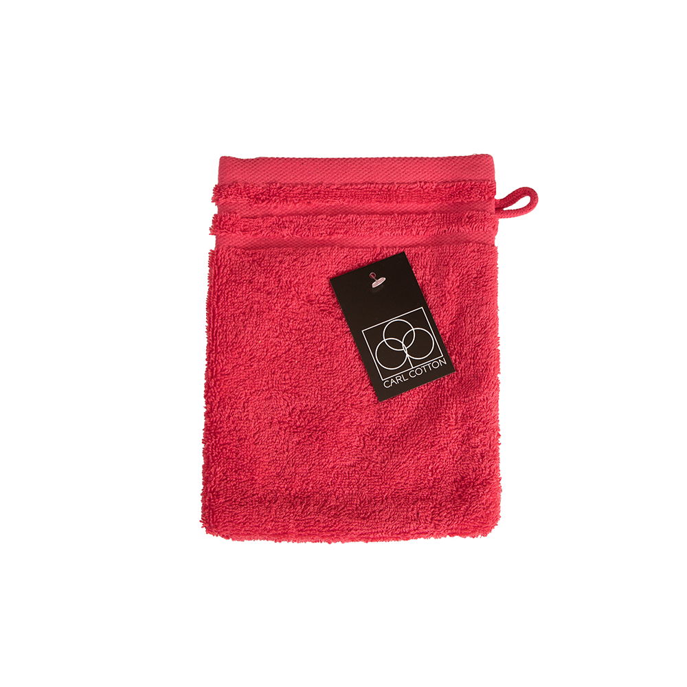 Ein Waschhandschuh von CARL COTTON aus 100 Prozent Baumwolle in der Groesse 16x21cm. Farbe Rot. Modell Trend Viva Magenta.