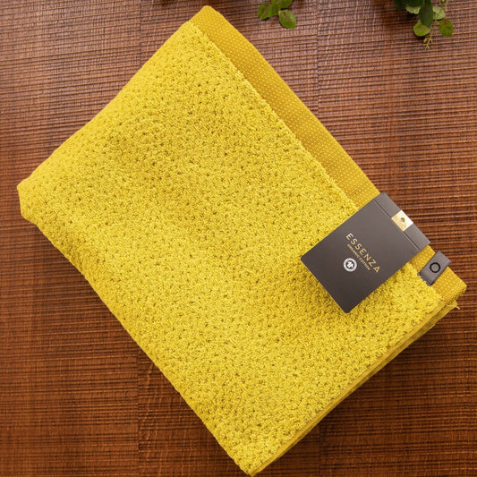 Ein Duschtuch von ESPRIT aus 100 Prozent Bio-Baumwolle in der Groesse 70x140cm. Farbe Gelb. Modell Breeze Yellow.